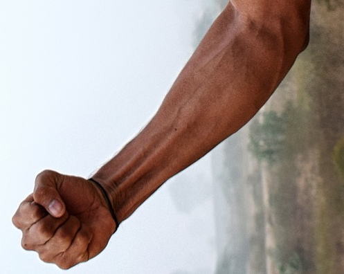 Massage Therapy Instructor Demonstration Forearm Flexor Strumping aka Active Release Technique (ART)